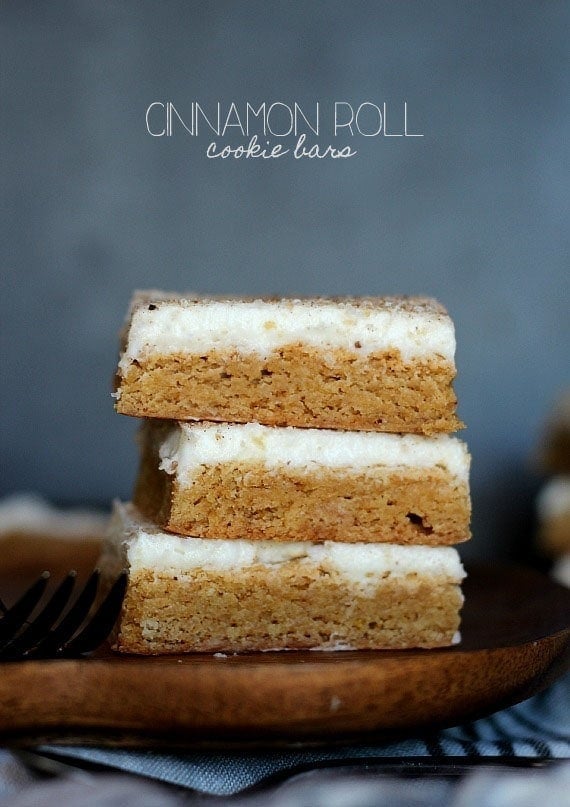 Cinnamon Roll Cookie Bars ~ Starts with a Cake Mix and is topped with delicious cream cheese frosting! www.cookiesandcups.com
