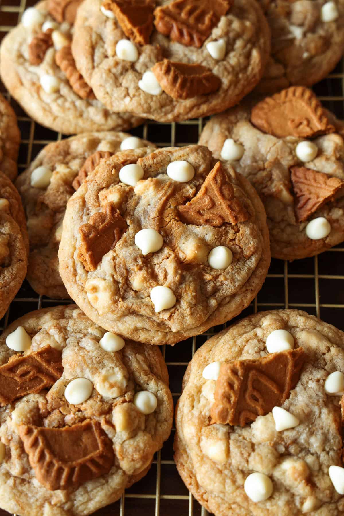 These absolutely delicious Stuffed Biscoff (Cookie Butter) Cookies are easy to make and are certain to impress. Filled and swirled with gooey Biscoff spread! Stuffed homemade Biscoff cookies with white chocolate stacked.