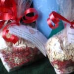 Close-up view of two bags of Reindeer Food with ribbon and a label