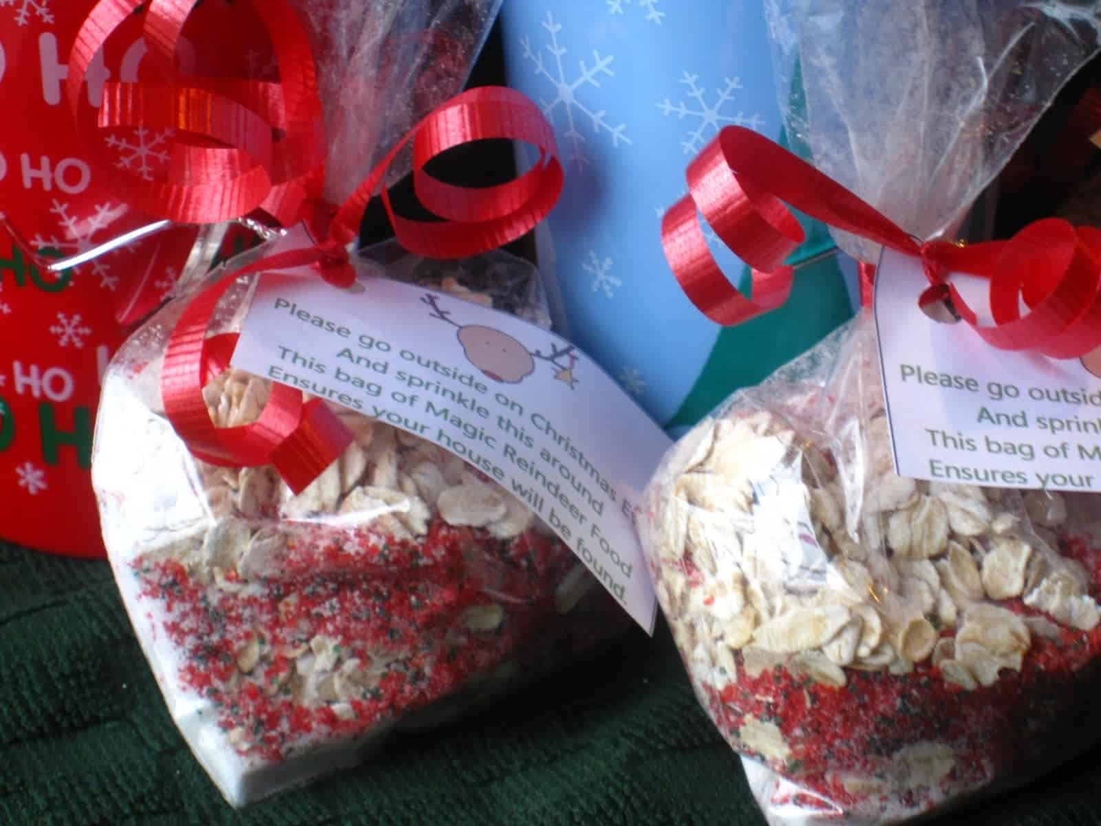 Close-up view of two bags of Reindeer Food with ribbon and a label