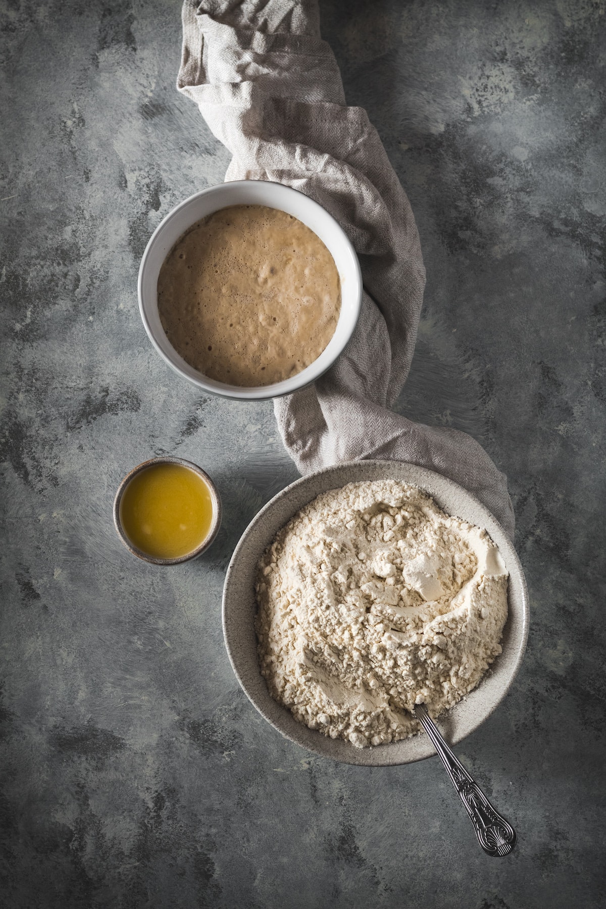 Yeast mixture for homemade pretzels with flour.