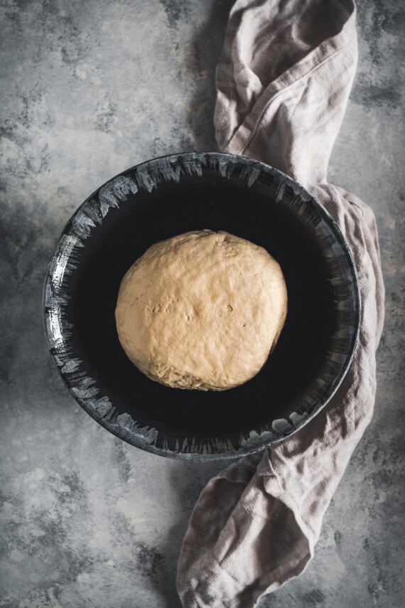 Pretzel dough in a bowl.