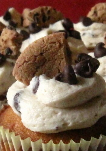 A Bunch of Frosted Cupcakes with Chips Ahoy Cookies and Chocolate Chips on Top