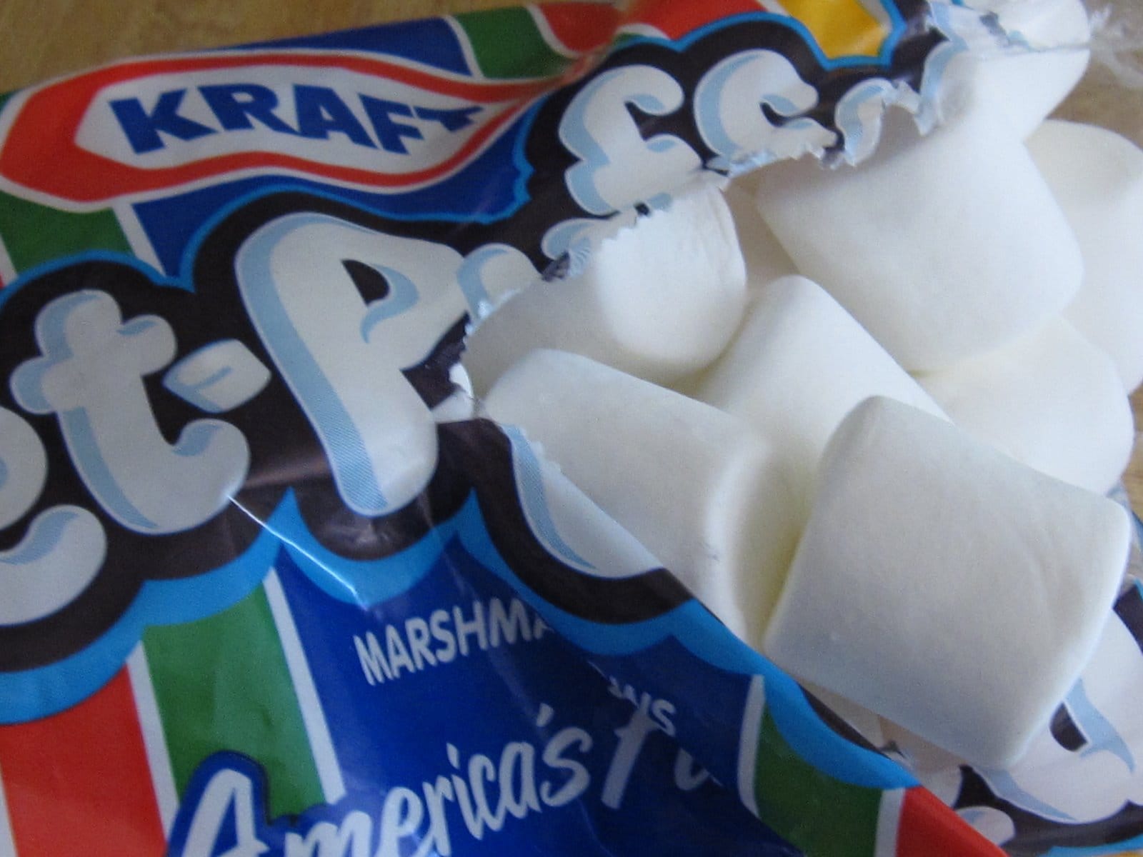 A package of Jet-Puffed marshmallows ripped open