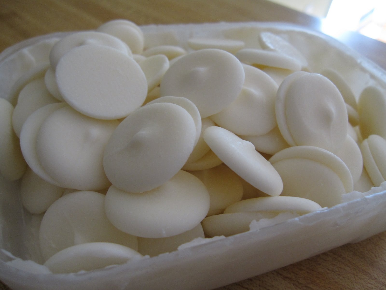 A bowl of white candy disks