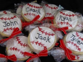 Overhead view of baseball-decorated cookies personalized with names