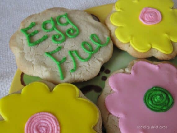 Overhead view of eggless sugar cookies decorated like flowers