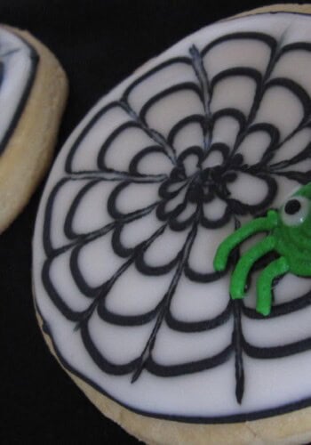 Close-up of cookies decorated as a spider web with spider