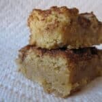 Close-up of two Snickerdoodle Bars stacked on a paper towel