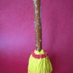 Oreo Truffle Witch's Broom with yellow icing bristles.