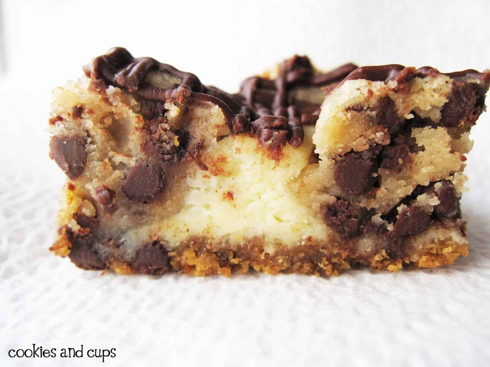 Side view of a Chocolate Chip Cookie Dough Cheesecake bar