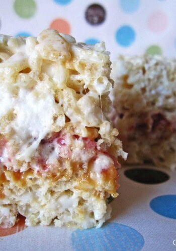 Close-up of a peanut butter and jelly krispie treat sandwich.