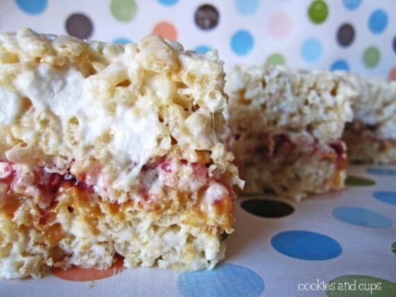 Close-up of a peanut butter and jelly krispie treat sandwich.