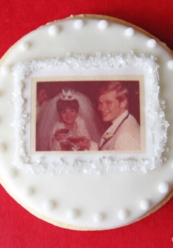 Decorated sugar cookie with anniversary photo on edible sheet