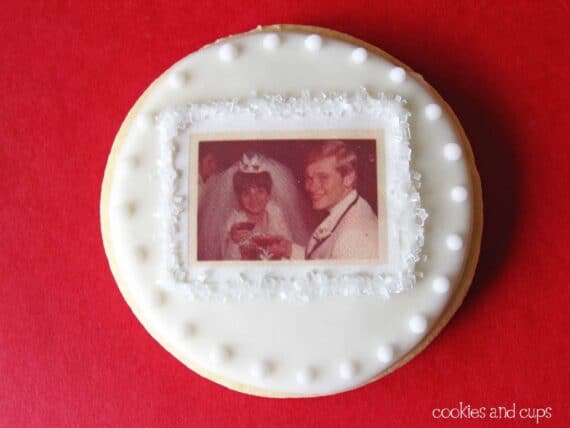 Decorated sugar cookie with anniversary photo on edible sheet
