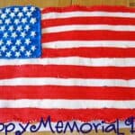 Overhead view of an American Flag-decorated sheet cake