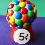 Close-up of a gumball cupcake with M&Ms.
