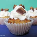 Close-up of peanut butter cookie cups with white chocolate buttercream