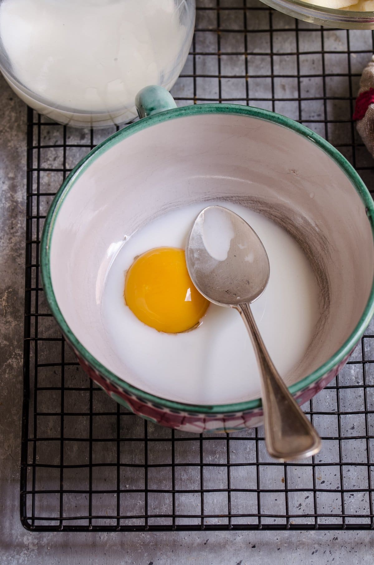 An egg yolk in a bowl.