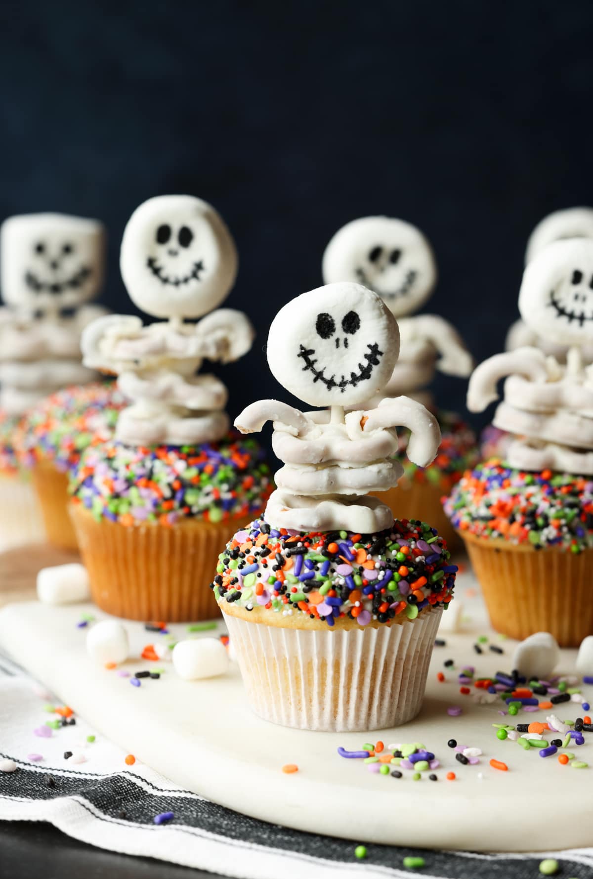 Skeletons with marshmallow heads and white chocolate pretzel 