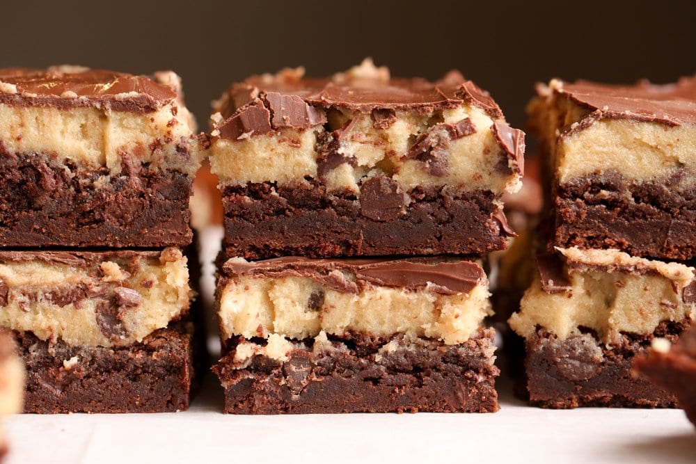 Fudge Brownies topped with raw cookie dough and chocolate ganache
