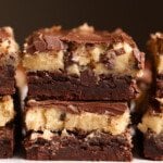 Cookie Dough Brownies stacked on a plate