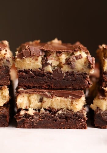 Cookie Dough Brownies stacked on a plate