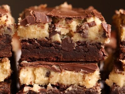Cookie Dough Brownies stacked on a plate