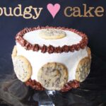 Side view of Pudgy Cake decorated with chocolate chip cookies around the sides