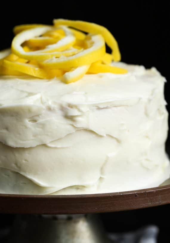 LEMONADE CAKE starts with a cake mix and is topped with lemon cream cheese frosting
