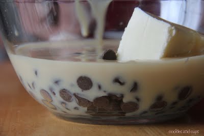 Microwave condensed milk, chocolate chips and butter in a bowl on high for 1 minute.
