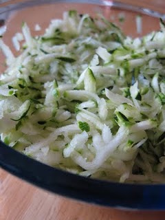 A bowl of grated zucchini.