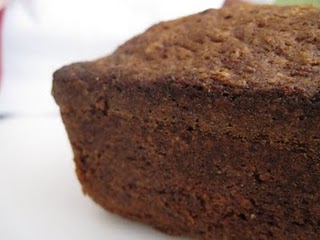 Side view of a baked zucchini bread loaf.