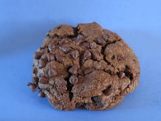 A Double Chocolate Overload Cookie on a blue background.
