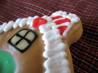 A Close-Up Shot of the Roof and Chimney of a Gingerbread House Decorated Sugar Cookie