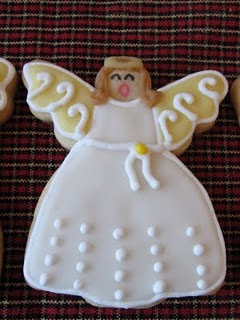 A Christmas Sugar Cookie Decorated with Royal Icing in the Form of an Angel