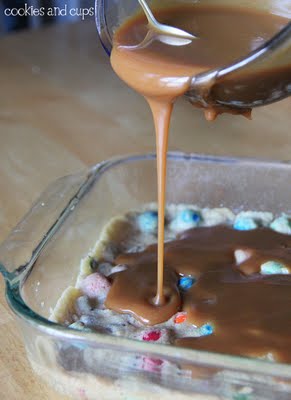 Melted Caramel Being Poured Over Baked Cookie Dough