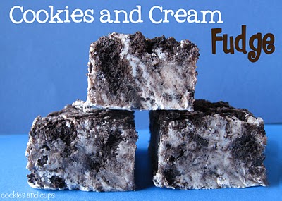 Three Pieces of Cookies and Cream Fudge Stacked on a Blue Surface