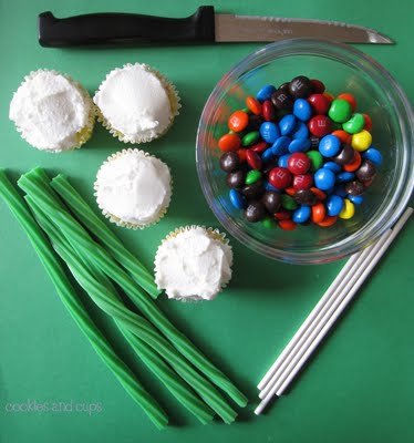 Overhead view of frosted cupcakes and decorations for Mother's Day Cupcake Bouquet