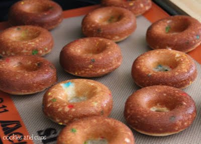 Funfetti donuts on a baking mat