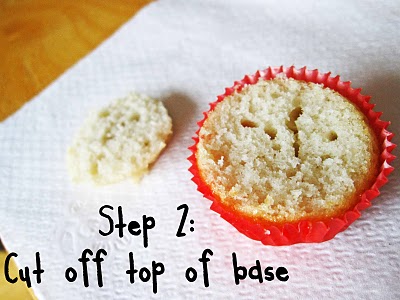 A cupcake with the top cut off showing Step 2