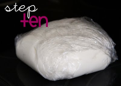 Homemade marshmallow fondant tightly wrapped in cling wrap.