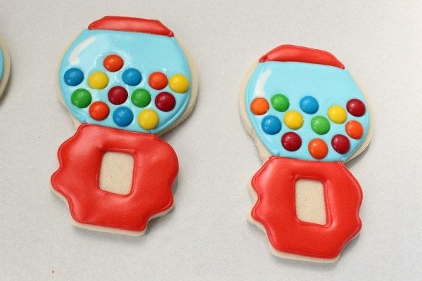 Two gumball machine decorated sugar cookies