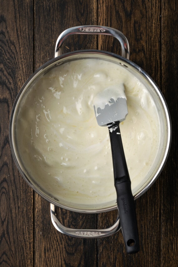 Melted marshmallow mixture in a saucepan.