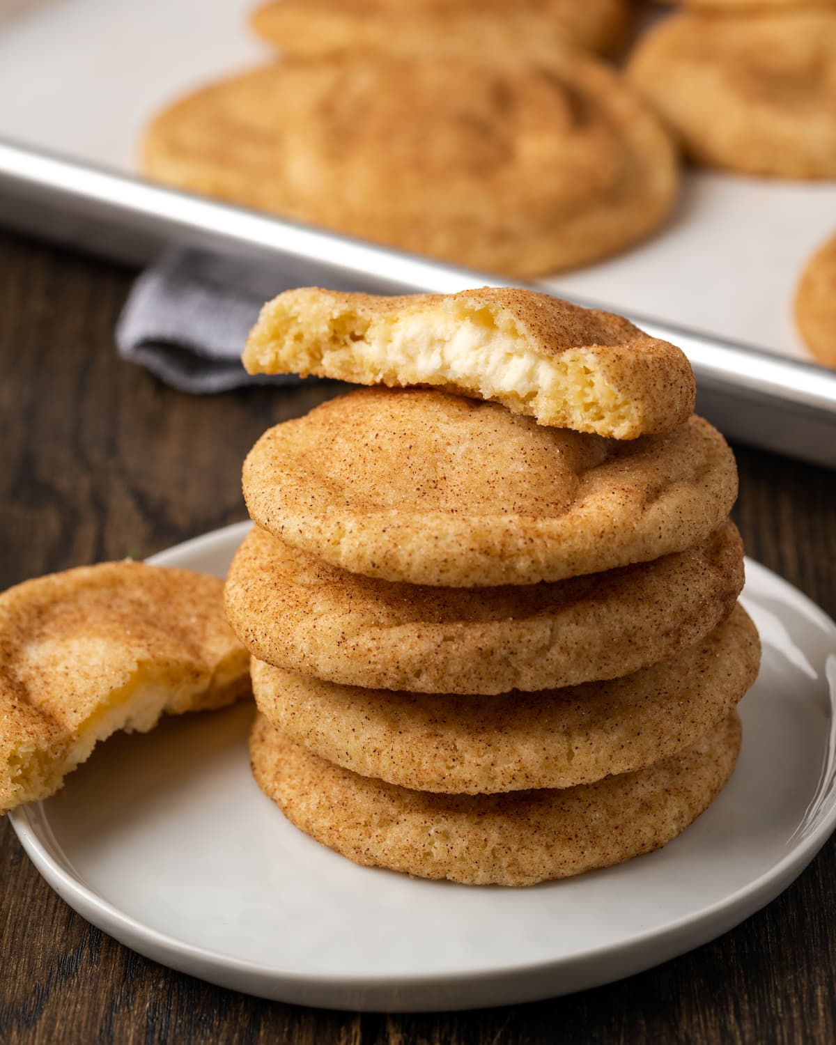 Stack of snickerdoodles on a plate.