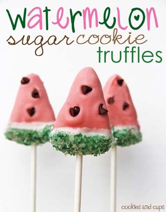 Three watermelon sugar cookie truffles on sticks.
