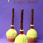 Three Witch's Broom Cupcakes with pretzel broomstick