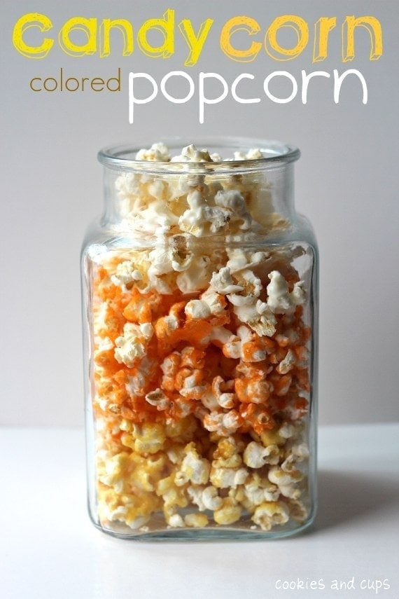 Side view of Candy Corn colored popcorn in a clear jar