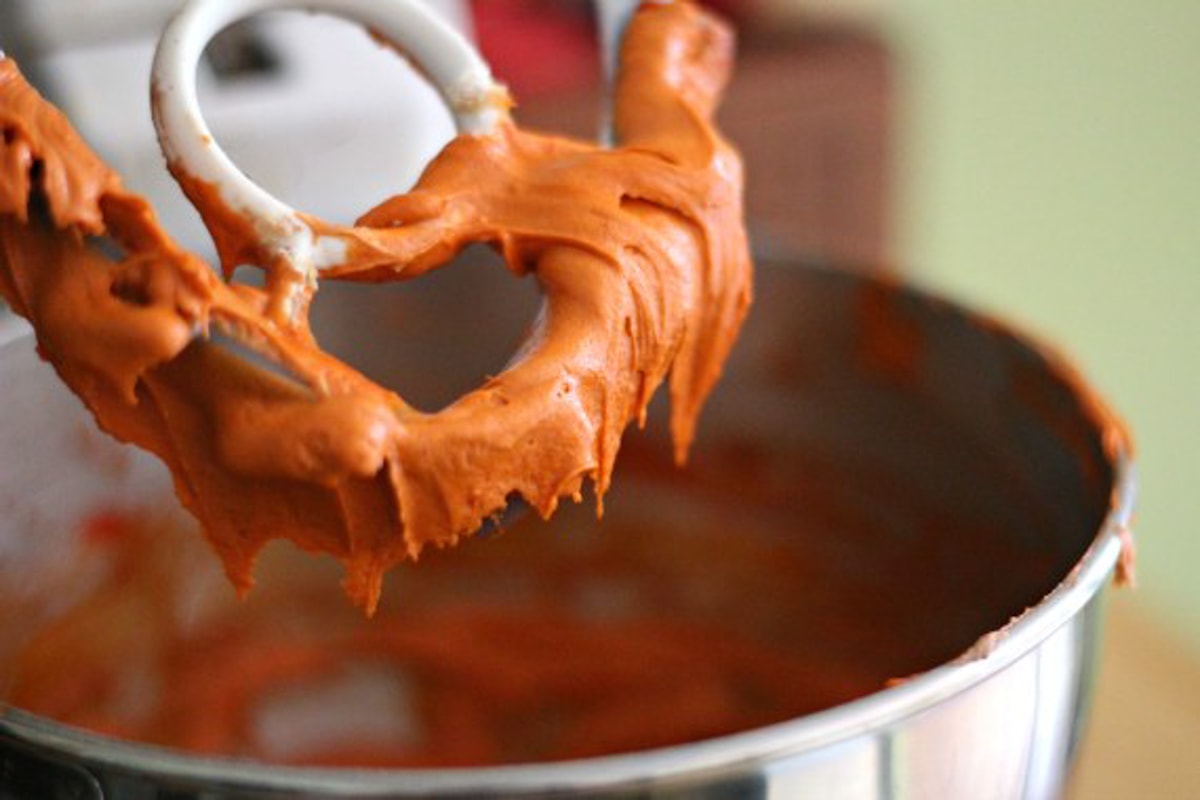 orange pumpkin whoopie pie batter in a mixing bowl