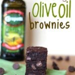 Double Fudge Olive Oil Brownies, stacked on a green napkin